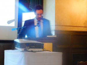 Man speaking at podium