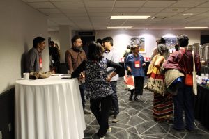 People chatting over coffee at the ACSA